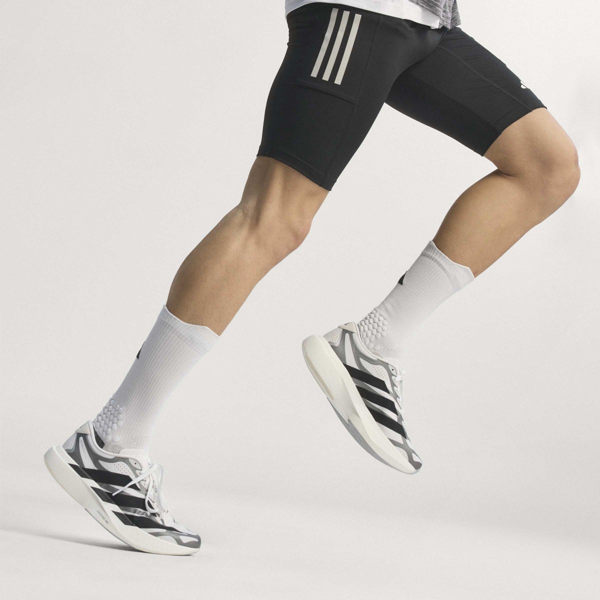 Adidas Adizero EVO SL EXO - Cloud White/Core Black/Iron Metallic